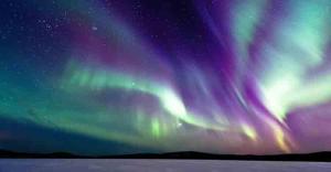 萨利色尔卡Auroracabin Chalets的天空中北极光的图像
