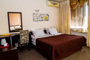 瑟索尼南布尔加斯酒店客房内的一张或多张床位