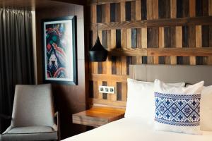 Hotel Indigo Guadalajara Expo, an IHG Hotel客房内的一张或多张床位