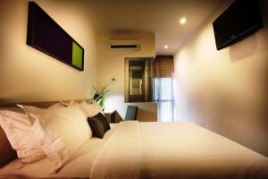 O'Boutique Suites Hotel @ Bandar Utama客房内的一张或多张床位