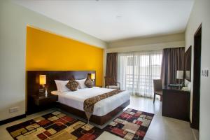 Hotel Grand Park Barishal客房内的一张或多张床位