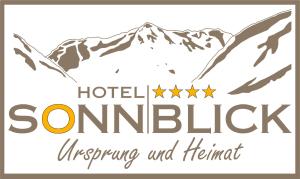 皮茨河谷圣莱昂哈德Hotel Sonnblick的山地酒店标志