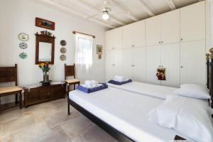 Tripiti Villa客房内的一张或多张床位