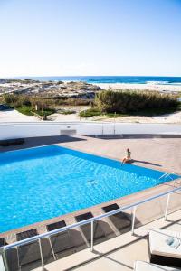 海滨 - 普拉亚德雷伊高尔夫及海滩度假酒店内部或周边的泳池