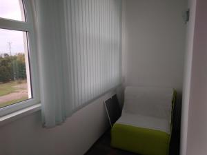 Omega City Apartments客房内的一张或多张床位