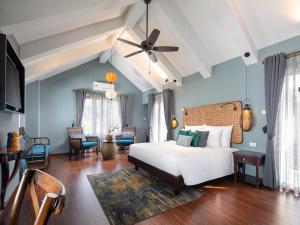 AIRA Boutique Hoi An Hotel & Villa客房内的一张或多张床位