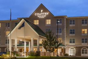 哈里斯堡Country Inn & Suites by Radisson, Harrisburg - Hershey West, PA的酒店前方的 ⁇ 染