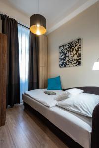伦巴赫中心套房公寓客房内的一张或多张床位