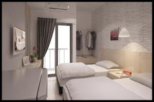 Expressia Stay at Serpong Greenview Apartment客房内的一张或多张床位
