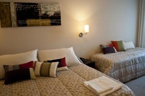艾雷斯·坦迪尔酒店客房内的一张或多张床位