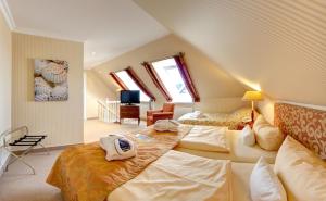 Strandhotel Sylt GmbH客房内的一张或多张床位