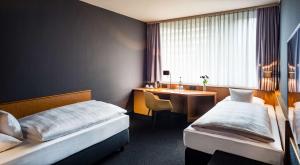 凯泽斯劳滕贝斯特韦斯特酒店客房内的一张或多张床位