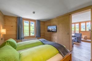 阿尔卑斯酒店客房内的一张或多张床位