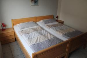 Ferienwohnungen im Gästehaus Sieberns客房内的一张或多张床位