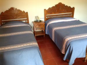 波萨达德拉萨鲁德酒店客房内的一张或多张床位