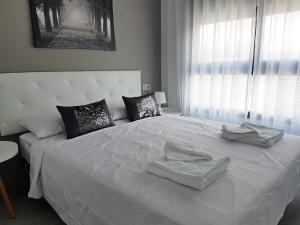 Apartments Lamar Homes PL002客房内的一张或多张床位