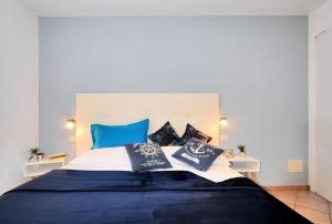 科拉洛公寓酒店客房内的一张或多张床位