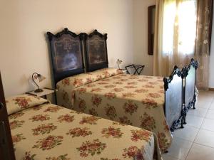 阿格利特玛瑟利亚里斯酒店客房内的一张或多张床位