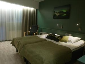 Hotelli Kivitippu客房内的一张或多张床位