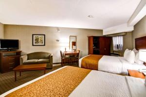基奇纳品质酒店客房内的一张或多张床位