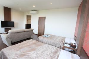 Fuji Zakura Hotel客房内的一张或多张床位