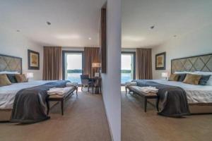 希贝尼克Bellevue Superior City Hotel的卧室两张照片,配有一张床和一张沙发