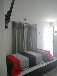 Departamentos Victorino客房内的一张或多张床位