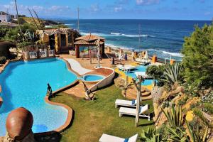 埃里塞拉安娜马格里达海滩度假屋的海滨度假胜地,设有游泳池
