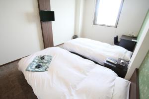 Fuji Zakura Hotel客房内的一张或多张床位
