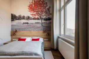 Lakeside Budapest Residences客房内的一张或多张床位
