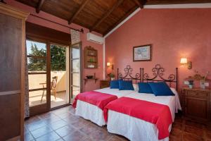 Hacienda Los Olivos客房内的一张或多张床位