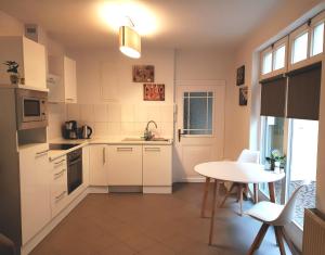 Studioapartment G16 - in exklusiver Innenstadtlage的厨房或小厨房