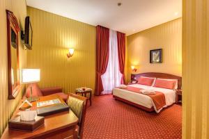 奥古斯塔鲁西拉宫酒店客房内的一张或多张床位
