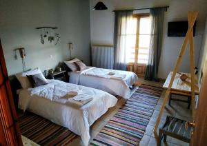 Orias Guesthouse & Farm客房内的一张或多张床位