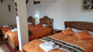 Hostal Jallalla客房内的一张或多张床位