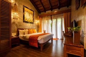 Ipoh Bali Hotel客房内的一张或多张床位