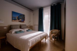 Casa Borgo Regina B&B - Bari Puglia Apartments客房内的一张或多张床位