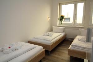 Apartments Tempelhof客房内的一张或多张床位