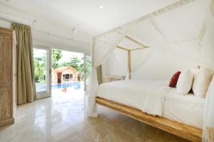 Villa Del Mar Canggu客房内的一张或多张床位