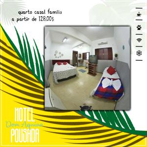 大坎普Pousada Dom Aquino的一张酒店客房的海报,配有一张床和一台电视机