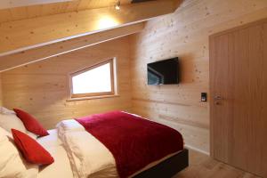 Heidi Chalets Falkert Heidialm - Chalet Almsommer客房内的一张或多张床位