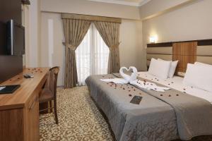 New Balturk Hotel Izmit客房内的一张或多张床位