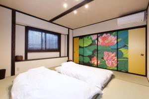 Zaimoku-an客房内的一张或多张床位