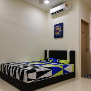 Neesa Homestay Bukit Gambang-Muslim客房内的一张或多张床位