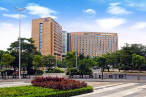 广州广州日航酒店 - 免费单程从酒店送至奥体&宝能演唱会的一座城市中高楼的大型建筑