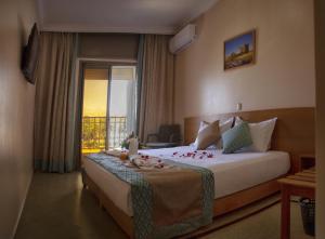 Hotel Al Mamoun客房内的一张或多张床位