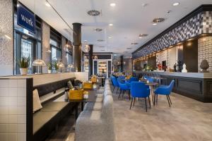 Holiday Inn - the niu, Square Mannheim, an IHG Hotel的休息区