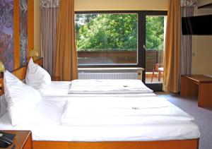 瑟劳酒店客房内的一张或多张床位
