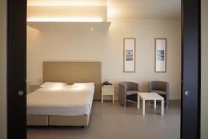维罗纳酒店客房内的一张或多张床位