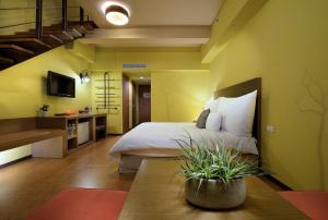 關西六福莊 生態渡假旅館客房内的一张或多张床位